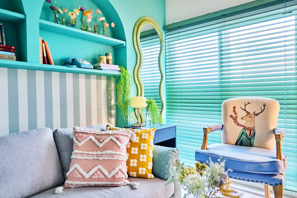 Living room corner with mirror and armchair